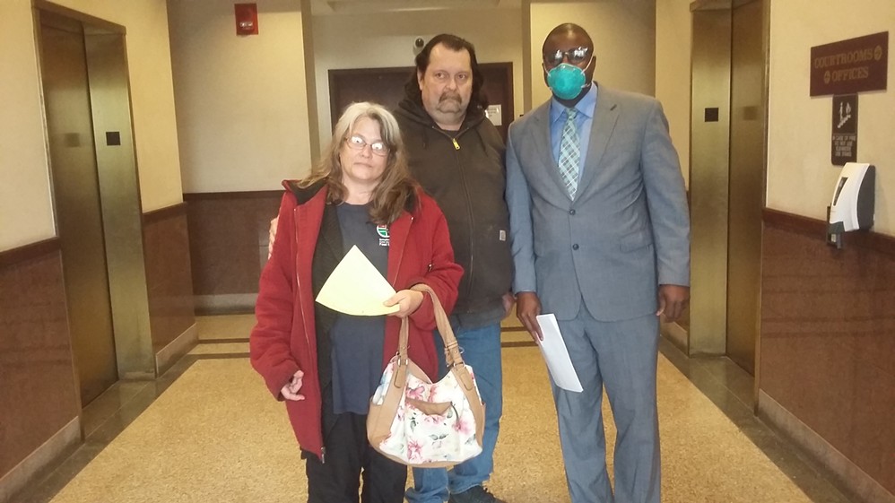 Rick and Carla Phelan with their lawyer Dowin Coffy.