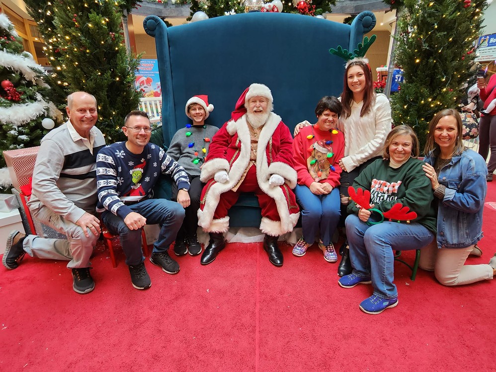 This family has gathered with Santa at White Oaks for 18 years!